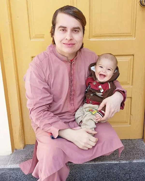 Nasir Khan Jan with his son Aayan